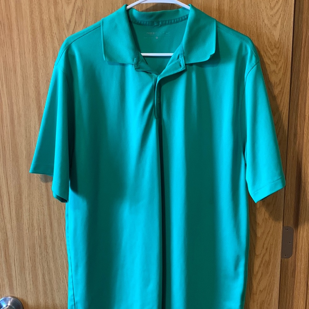 Men’s green Nike golf polo